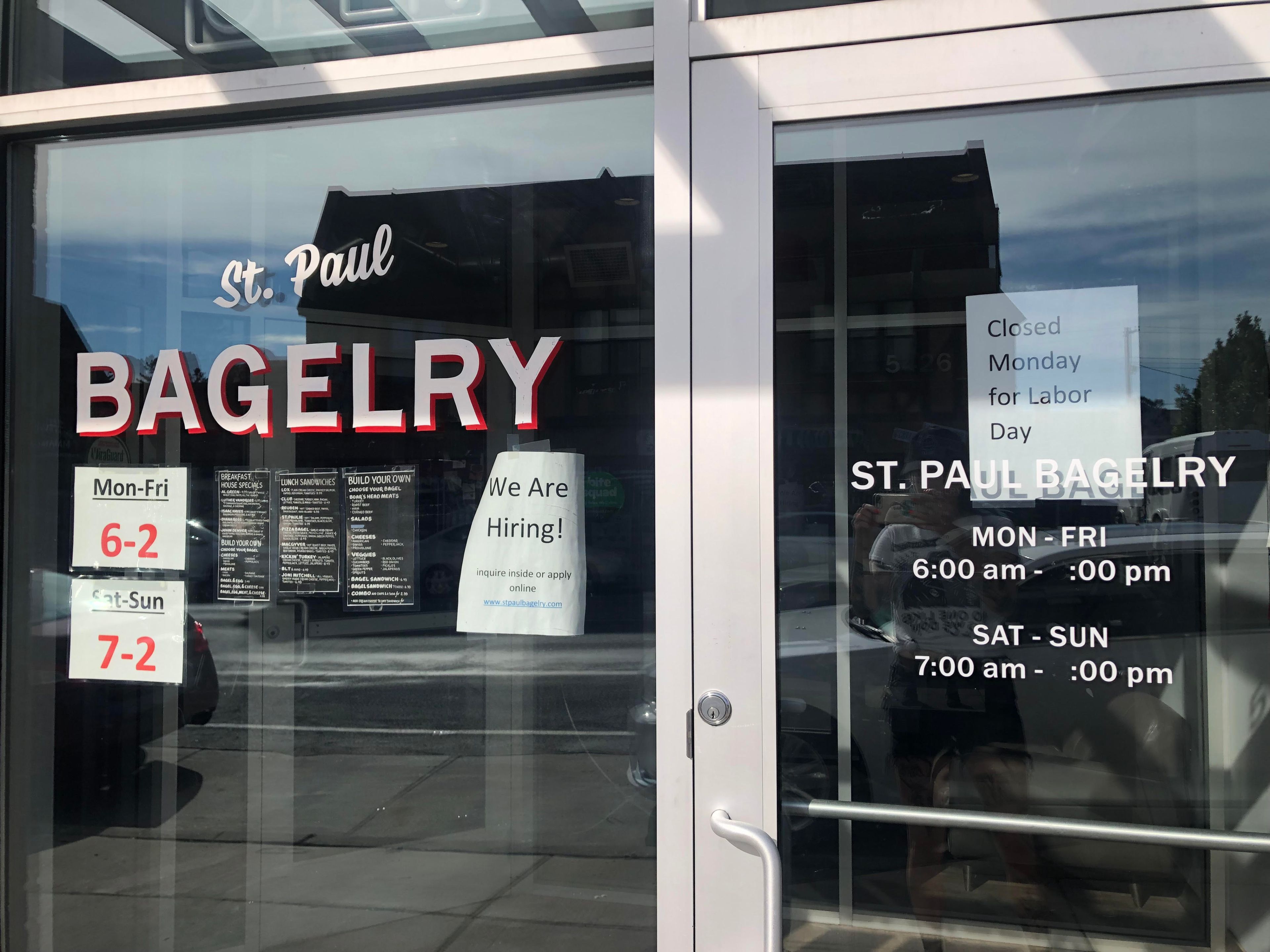Sign on St. Paul Bagelry's door shows that they're closed on Labor Day