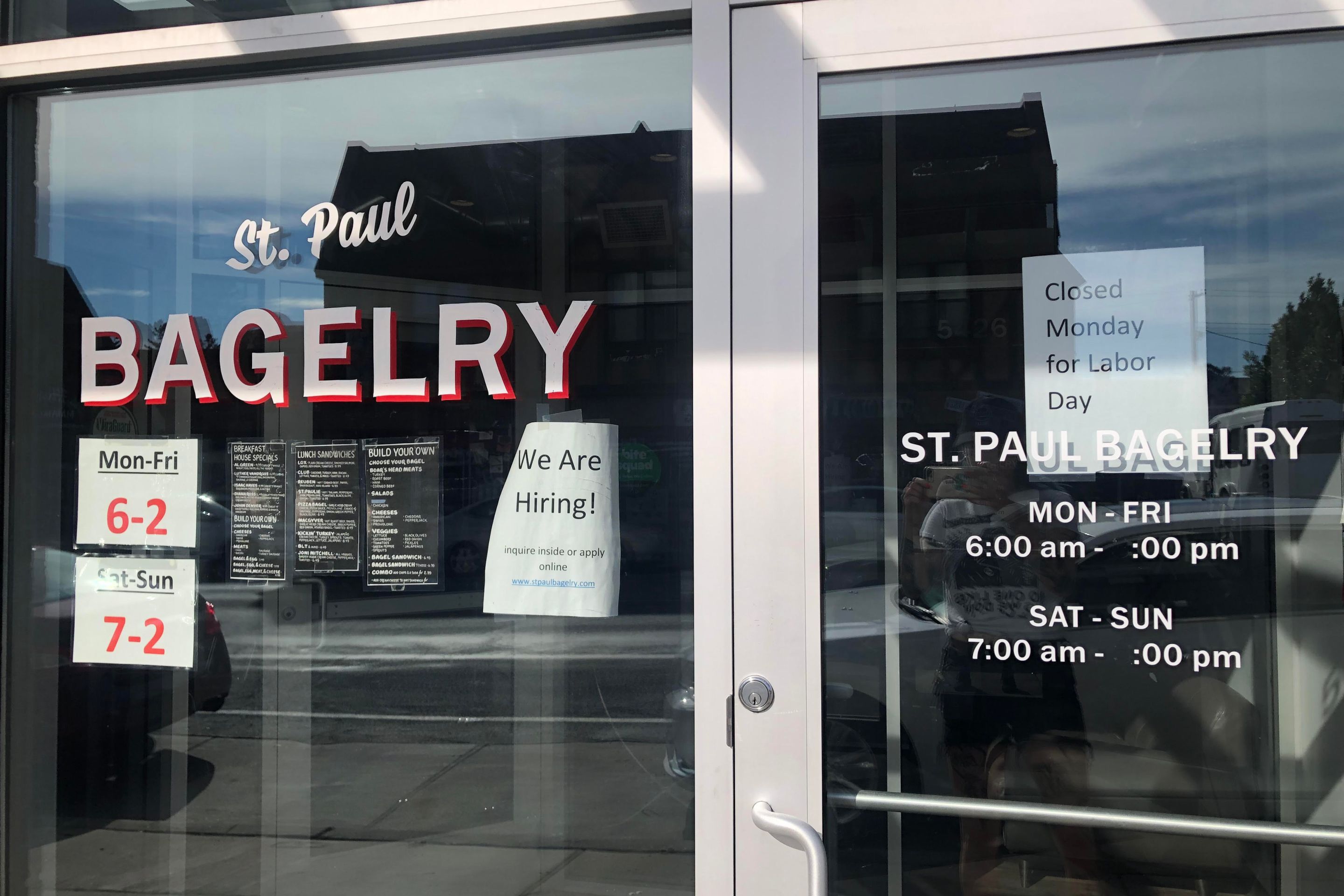 Sign on St. Paul Bagelry's door shows that they're closed on Labor Day