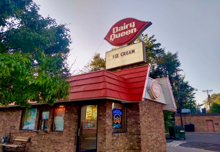 An external shot of a Dairy Queen, where the sign simply reads, "ICE CREAM."