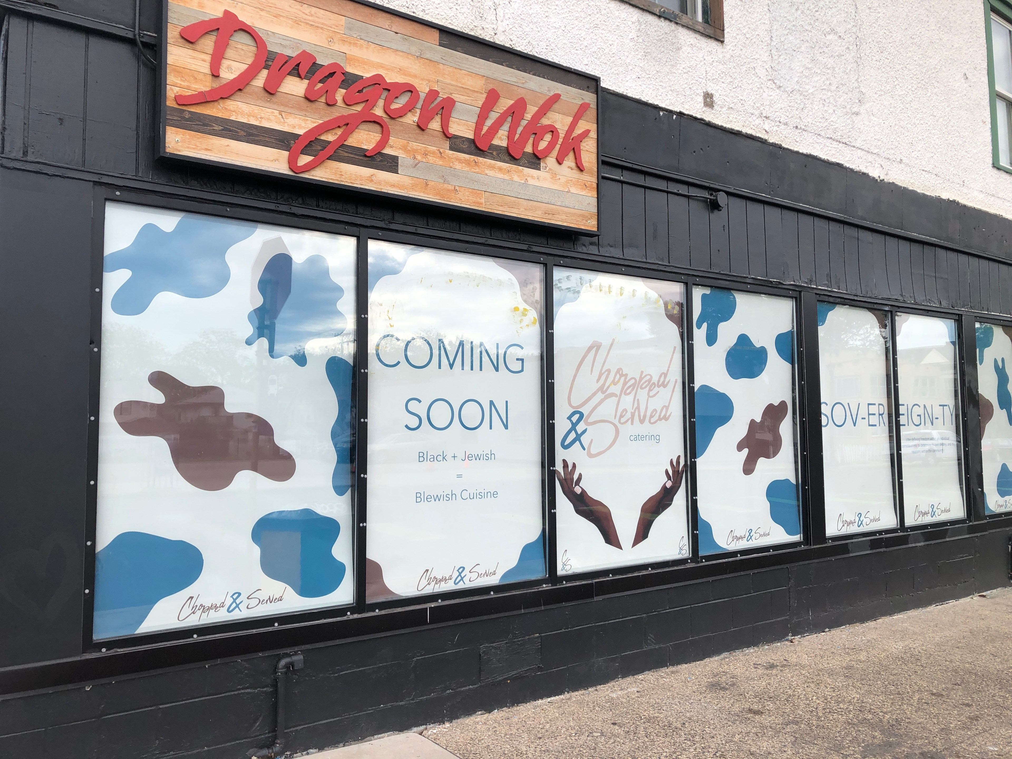 the exterior of the building at 805 E 38th St, Minneapolis, where the Dragon Wok sign still hangs, featuring Chopped & Served's "coming soon" signs in the windows