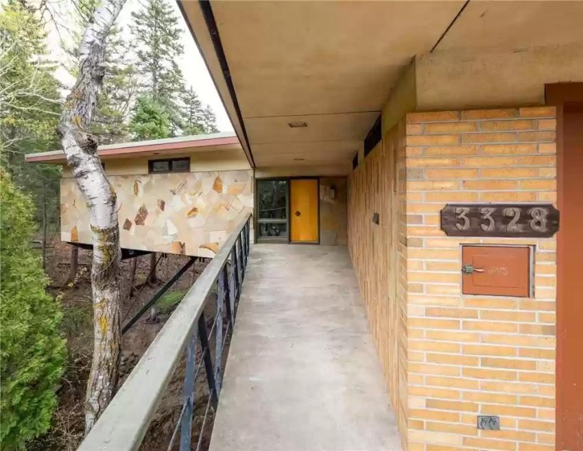 Wanna Buy a Floating Duluth House with an Underground Pool? Racket