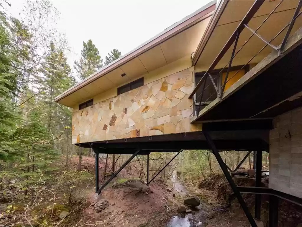 Wanna Buy a Floating Duluth House with an Underground Pool? Racket