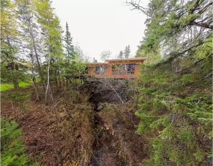 Wanna Buy a Floating Duluth House with an Underground Pool? Racket