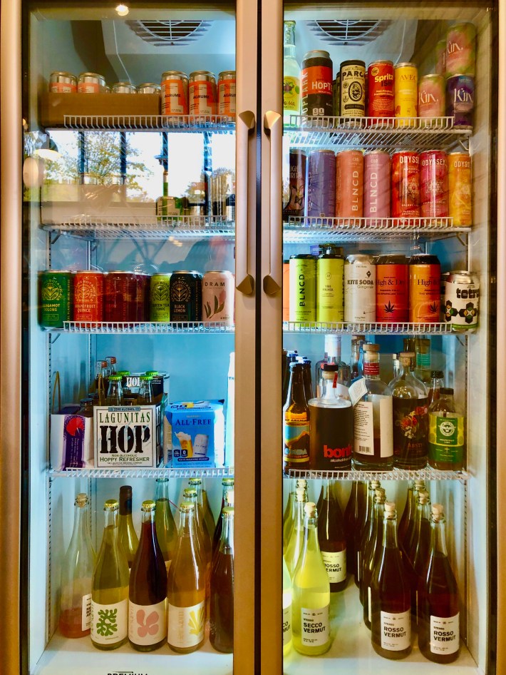 the fridge at marigold, which is stocked with colorful cans and bottles of NA bevs