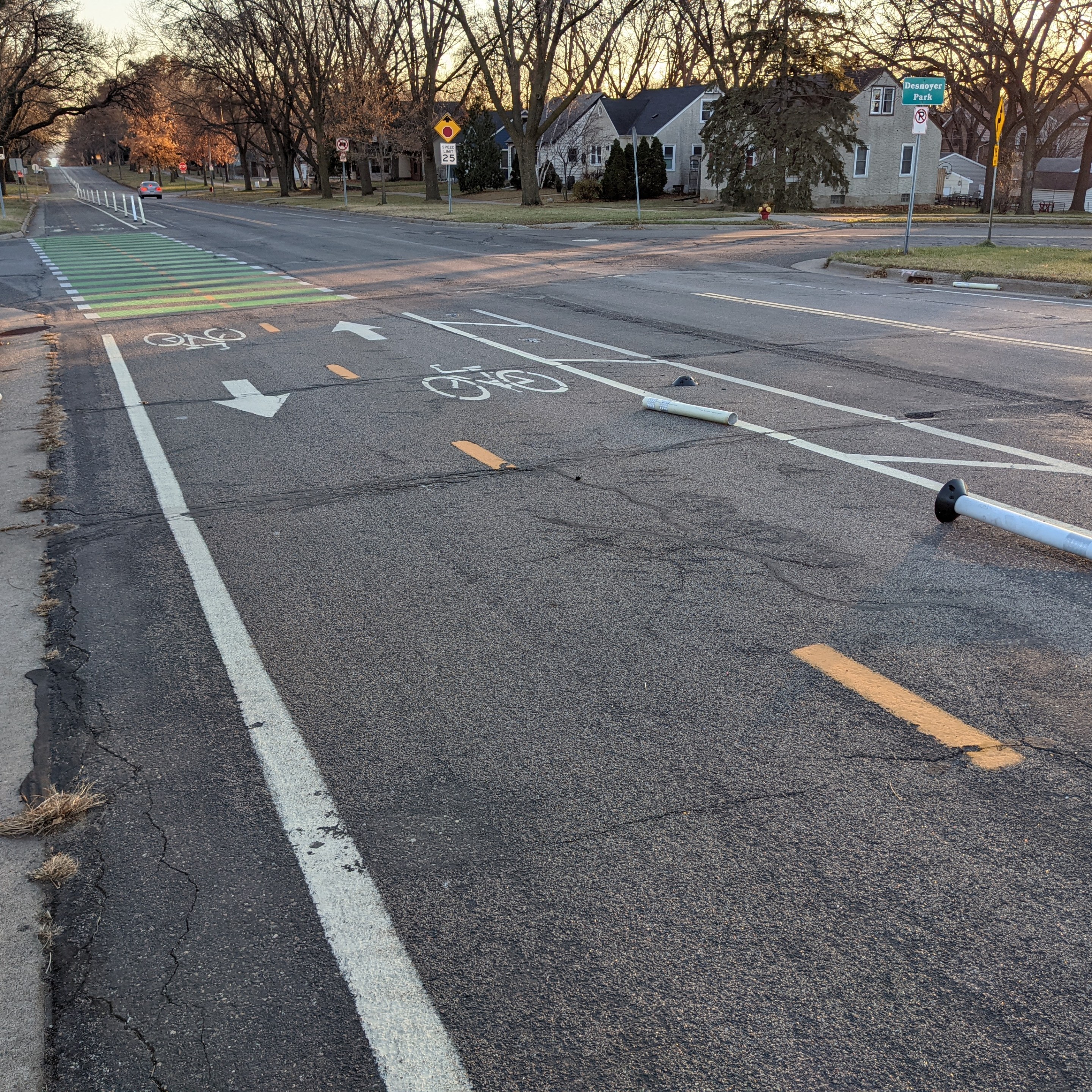 an overhead view of pelham boulevard, with smashed bollards lining the road