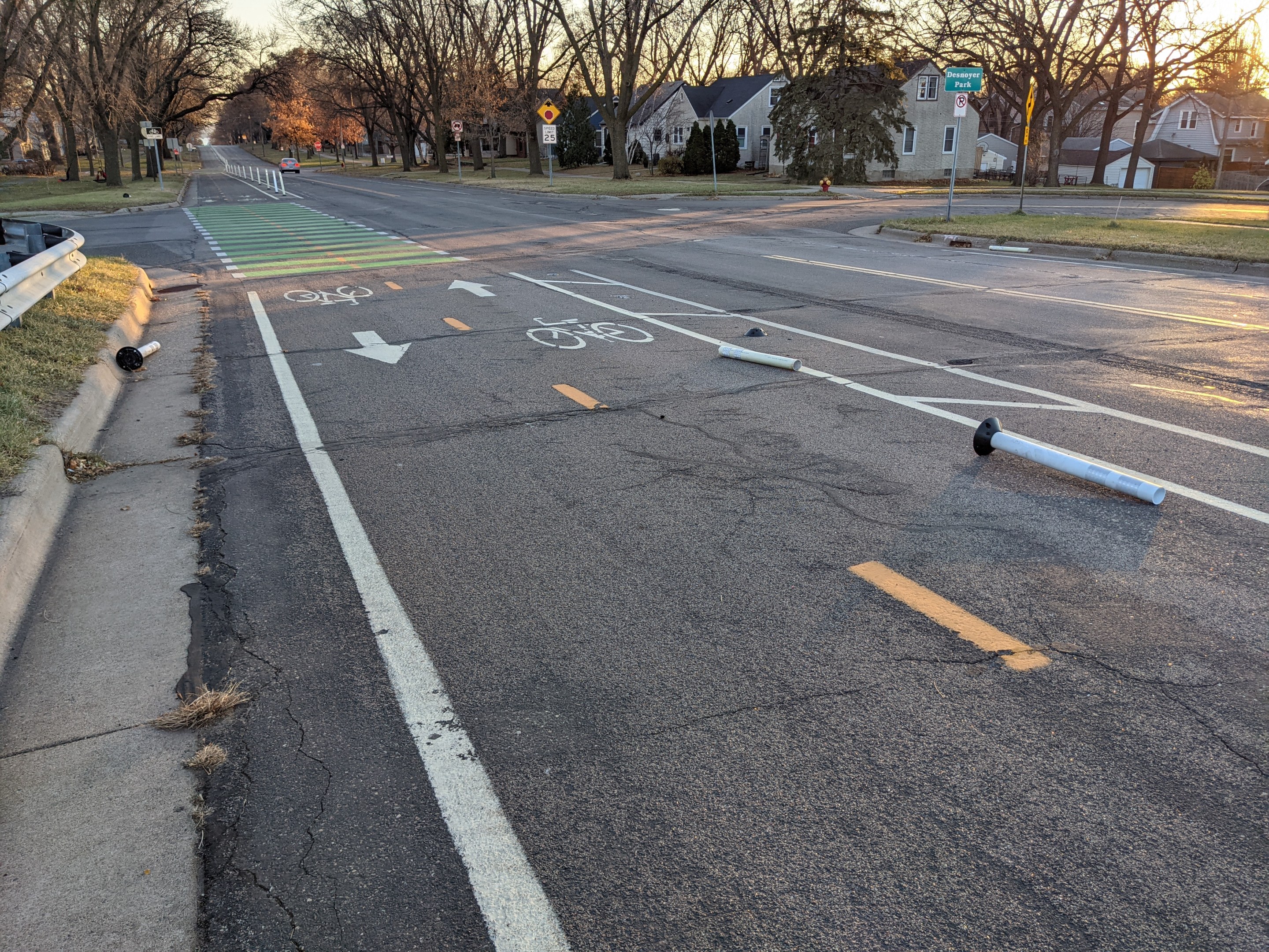 an overhead view of pelham boulevard, with smashed bollards lining the road