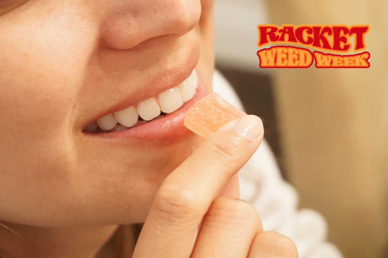 a woman puts a pink weed gummy in her mouth