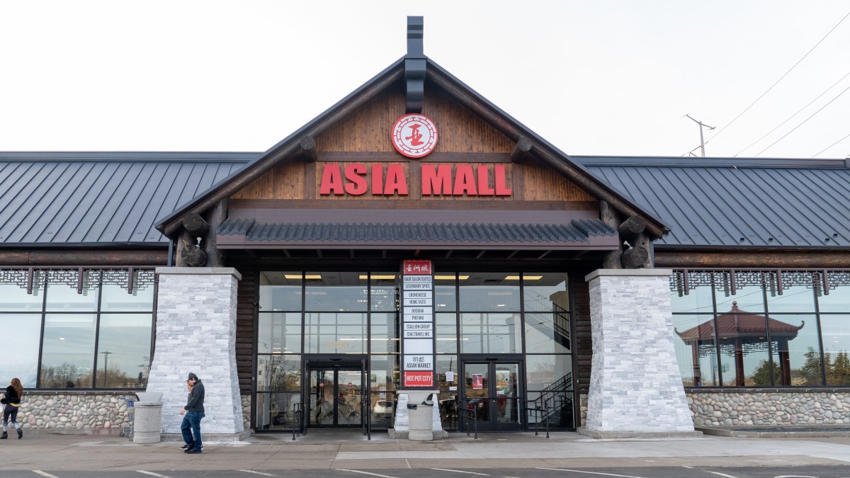 the exterior of asia mall, with a bright red sign
