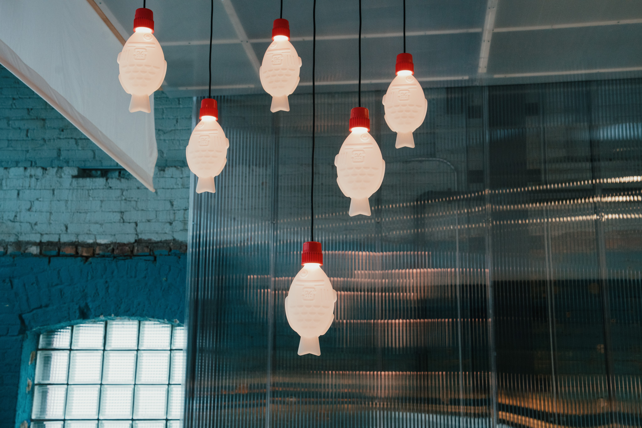 dangling red and white fish lights at the new sushi dori