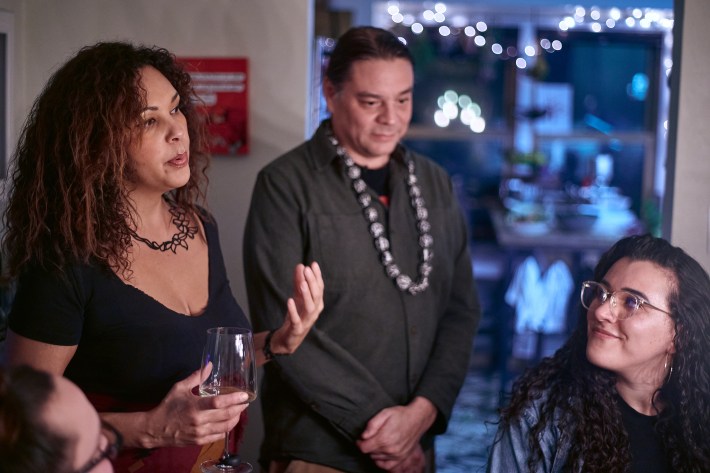 Longtime local food writer Mecca Bos, a BIPOC Foodways Alliance co-founder, speaks to an assembled group next to her partner, Sean Sherman